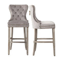 Carter Set of 2 Tufted Wingback Bar Stools with Nailhead Trim and Antique Grey Legs