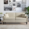 Upholstered Loveseat with Rolled Arms and 73 Nailhead Trim